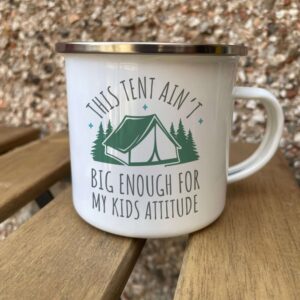 Enamel mug with a tent