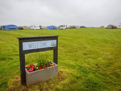 Welcome sign in front of the campsite